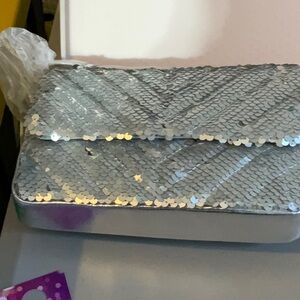 Nicole Miller Silver Clutch/shoulder Bag great for Christmas and New Year’s 🎉